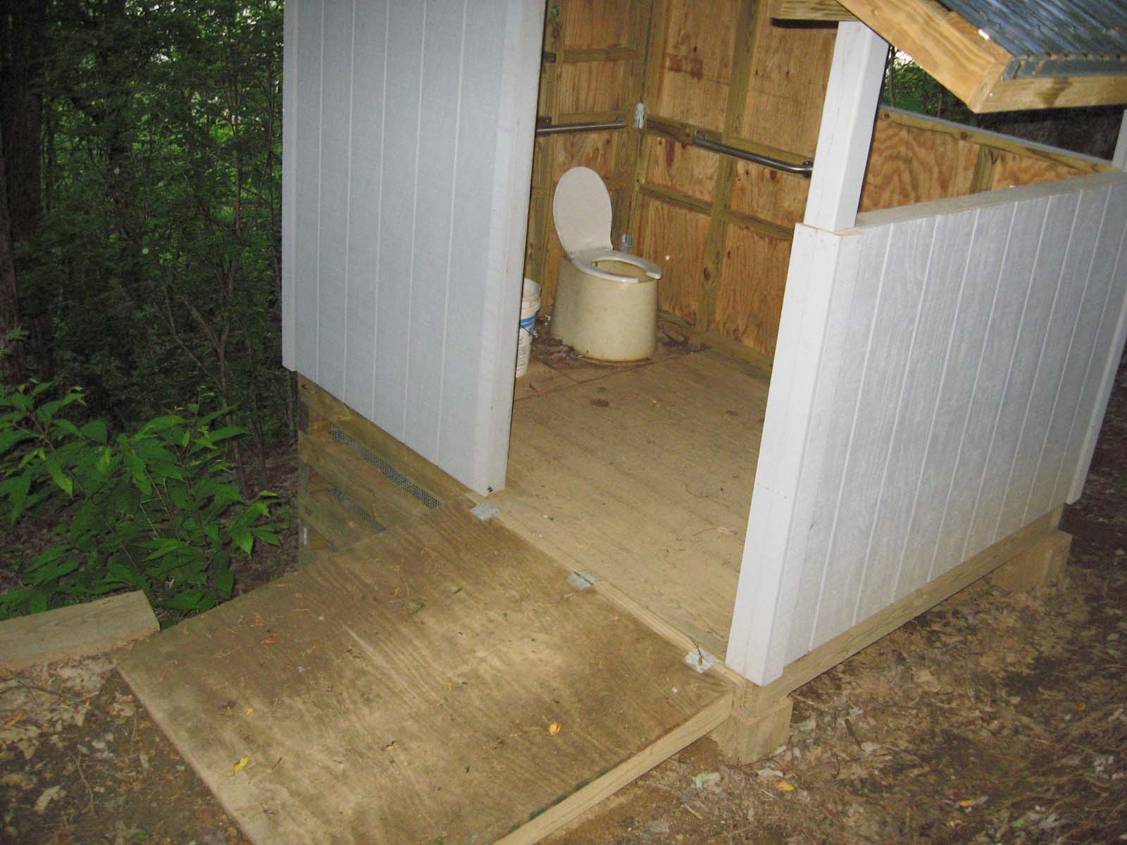 NC state regulations call for handicap accessible privies on top of a completely inaccessible mountain.